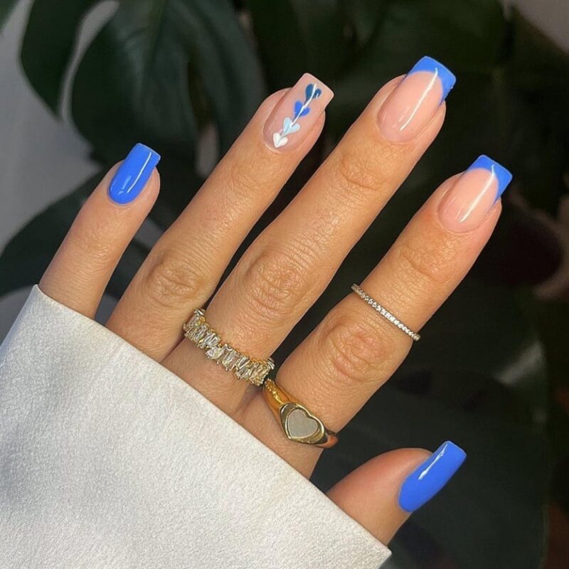 Blue French Tips With Leaf Accent — Winter Blue Nails