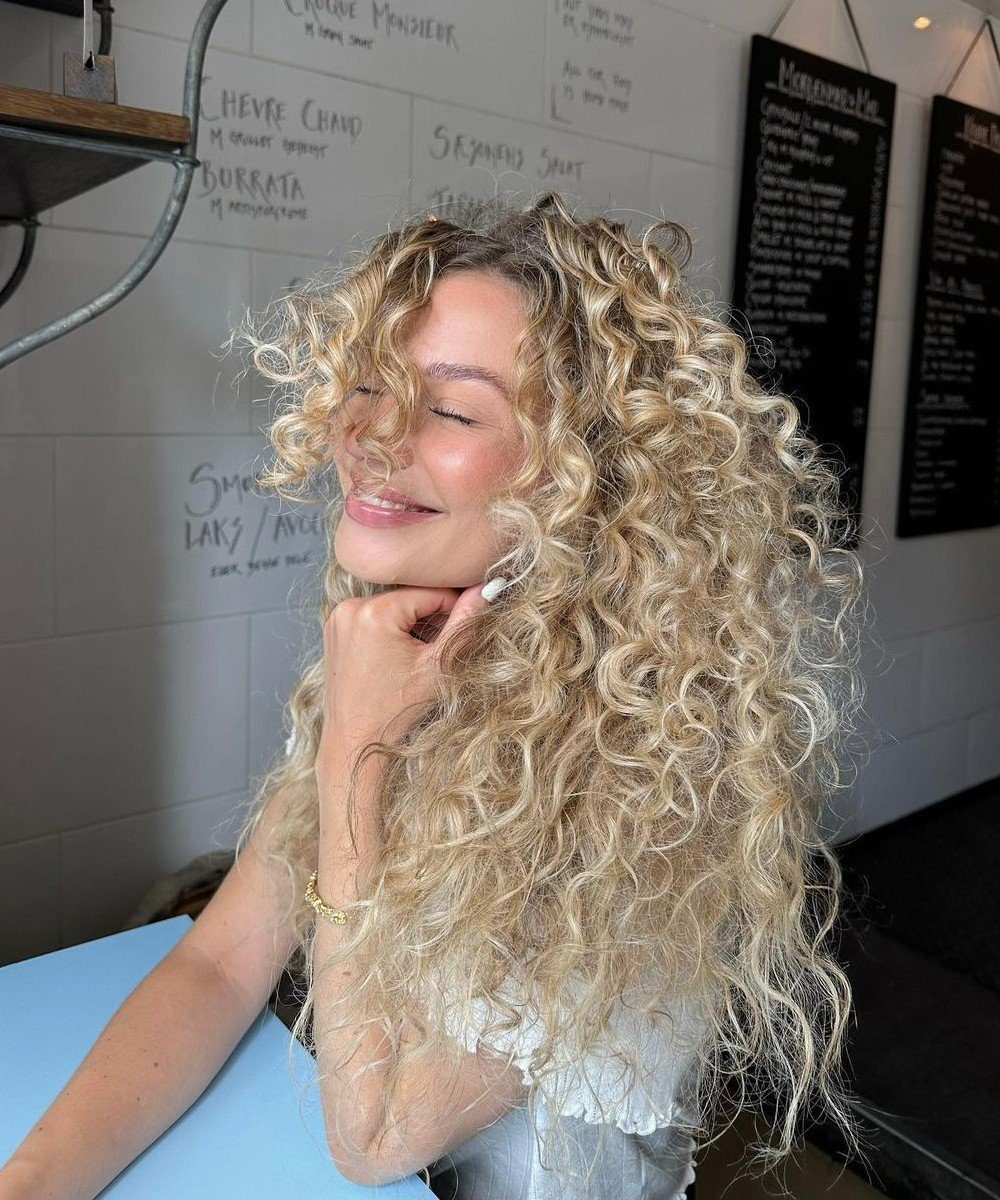 Ash Blonde Visual Idea — Winter Haircuts for Curly Hair