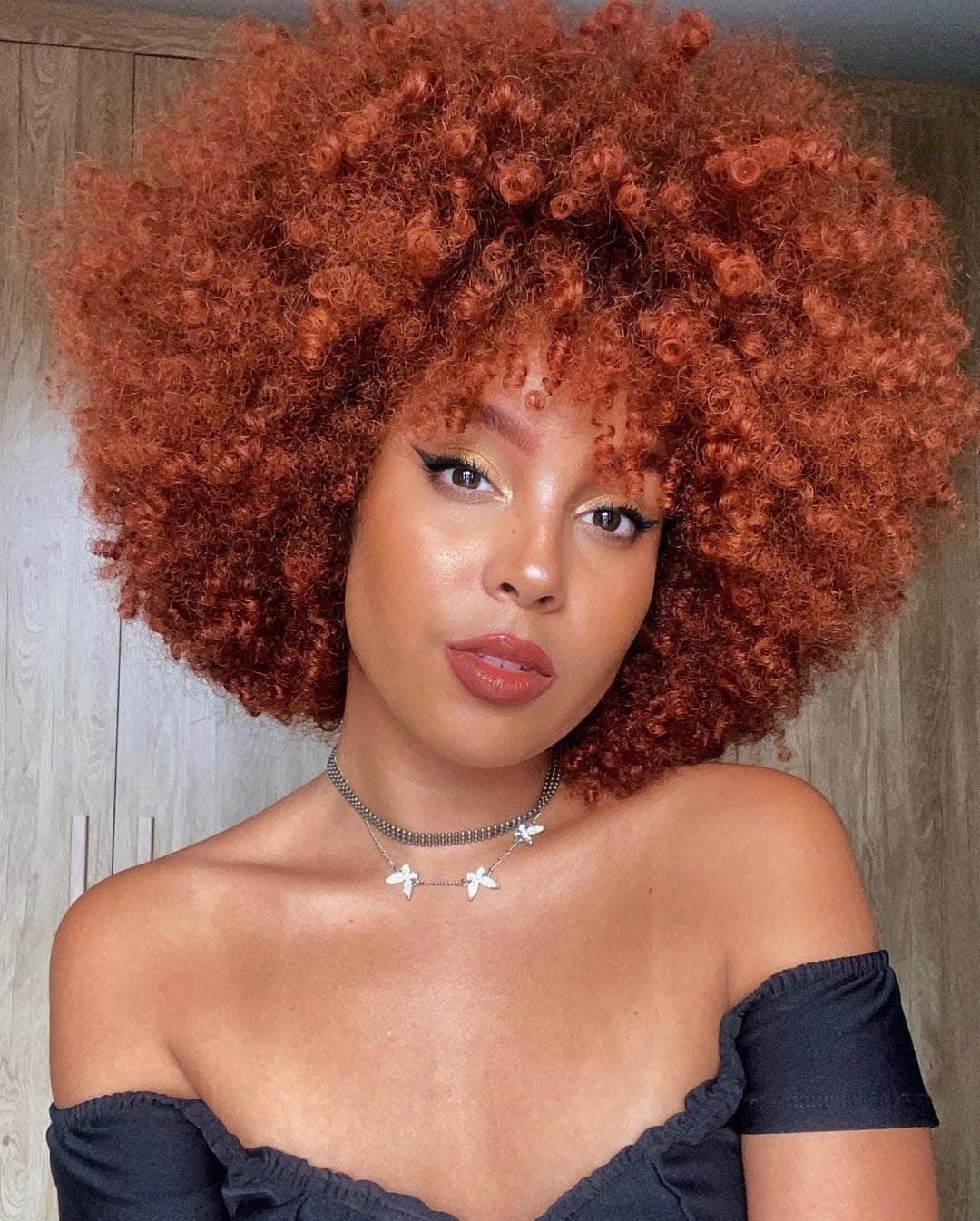 Afro in Vibrant Copper Red Afro in Vibrant Copper Red — Winter Hair Colors for Black Women