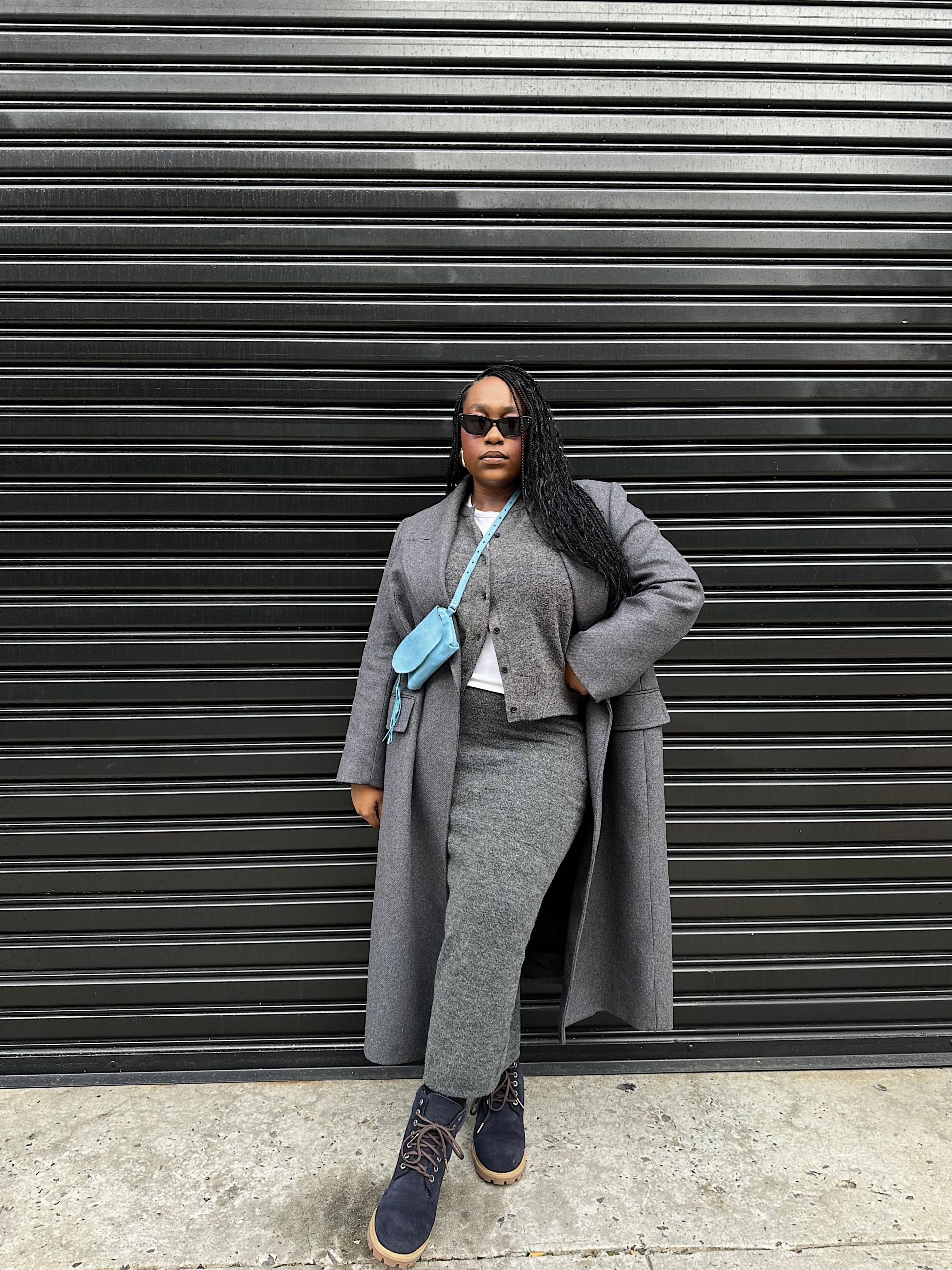Monochromatic Layers: Long Coat, Midi Skirt, and Navy Timberlands — Timberland Boots Outfits