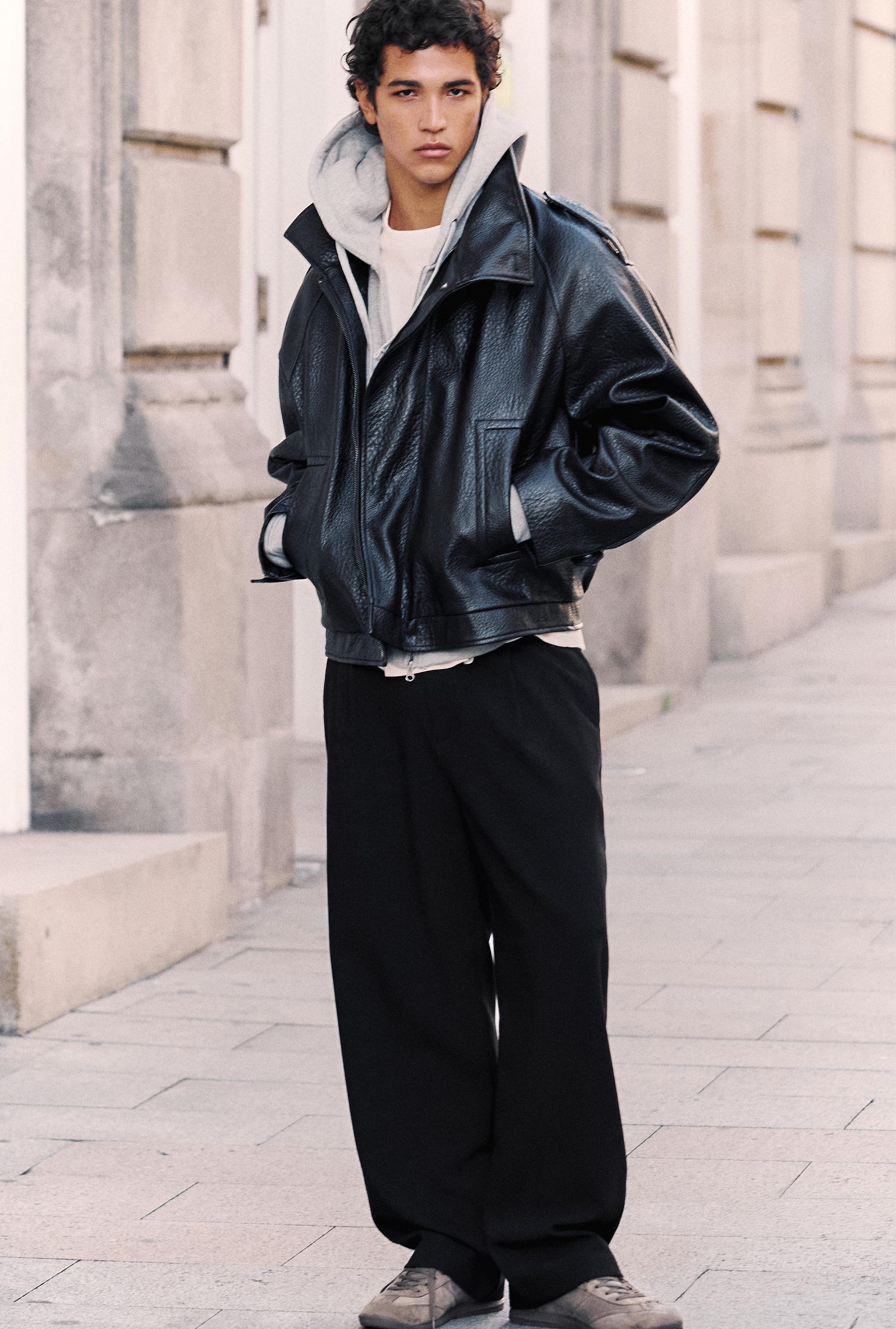 Oversized Leather Jacket with Layered Hoodie — Winter Outfits for Men
