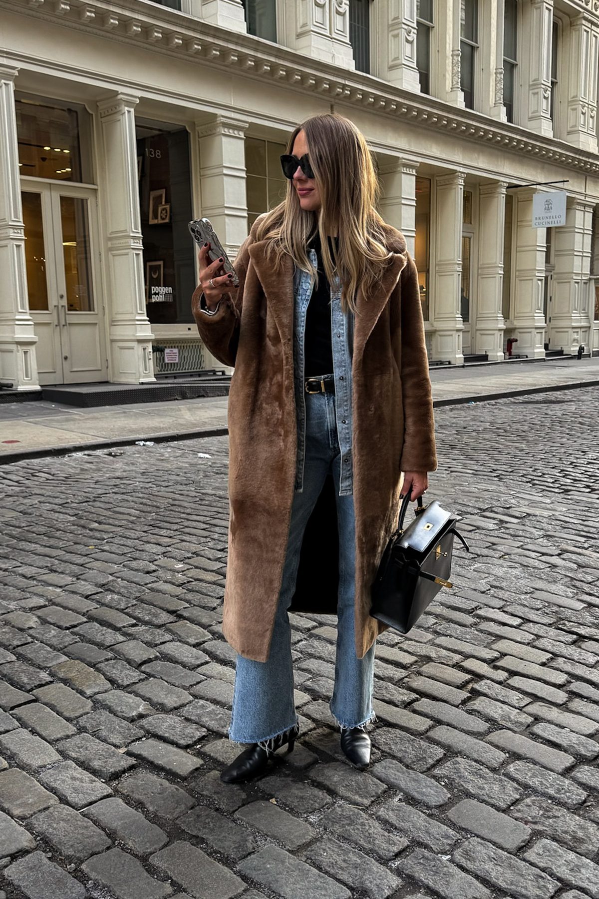 Brown Faux Fur Coat Over Denim Shirt and Blue Jeans — NYC Winter Outfits