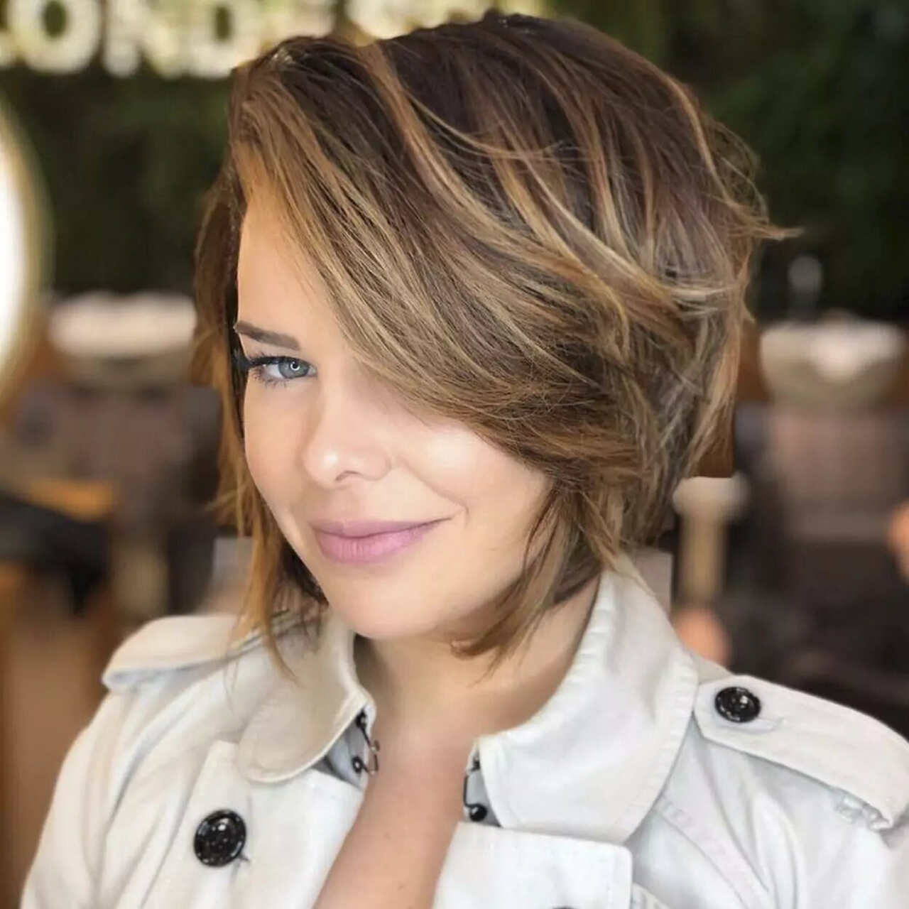 Short Textured Bob With Side-Swept Bangs Short Textured Bob With Side-Swept Bangs — Winter Haircuts for Women Over 40