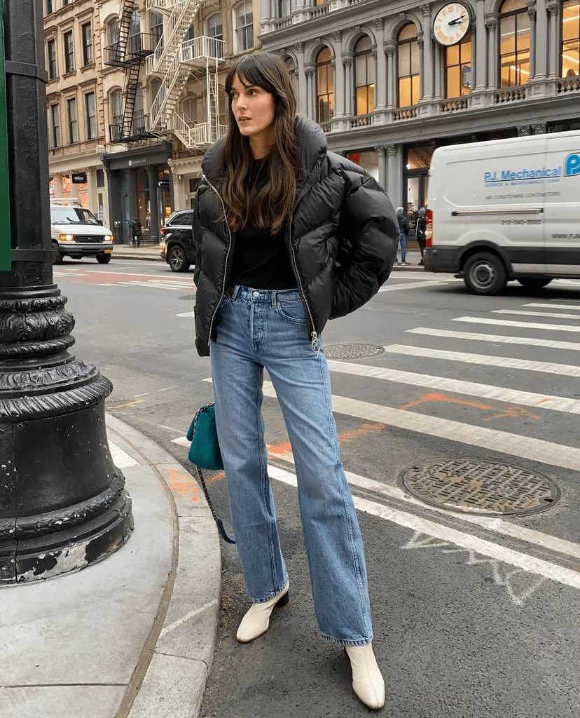 Black Oversized Puffer with Teal Handbag and White Boots — Winter Puffer Jacket Outfits