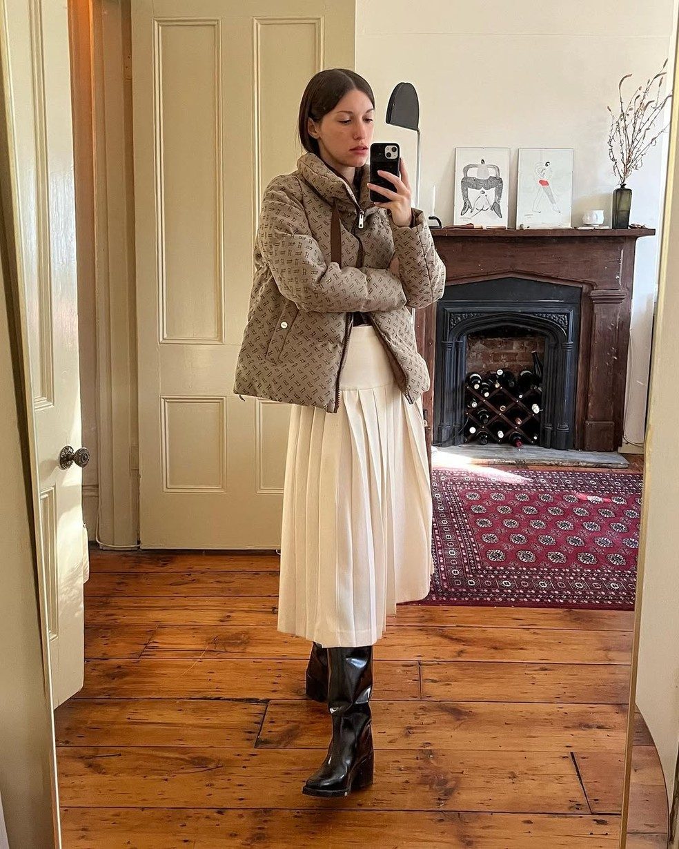 Pleated Midi Skirt with Statement Puffer Jacket and Boots — Winter Skirt Outfits