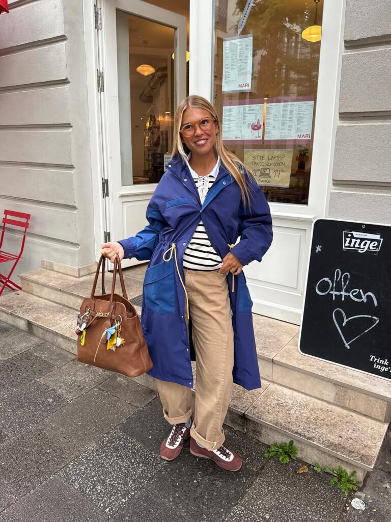Striped Tee and Color-Blocked Parka: Playful Outdoor Transition — Winter to Spring Transition Outfits