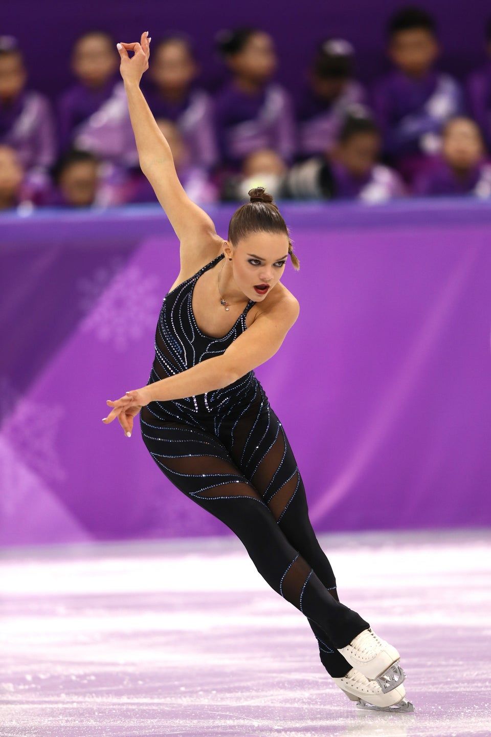 Sleek Black Bodysuit with Blue Sheer Mesh Panels Sleek Black Bodysuit with Blue Sheer Mesh Panels — Ice Skating Outfits