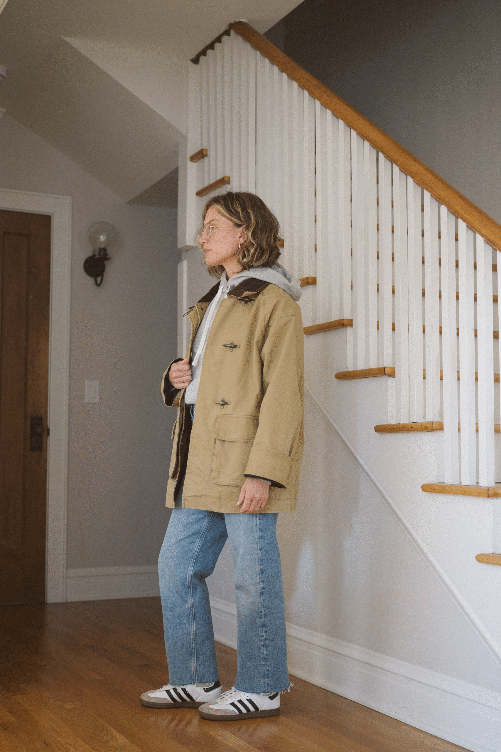 Tan Barn Jacket with Grey Hoodie and Blue Jeans — Parka Outfits