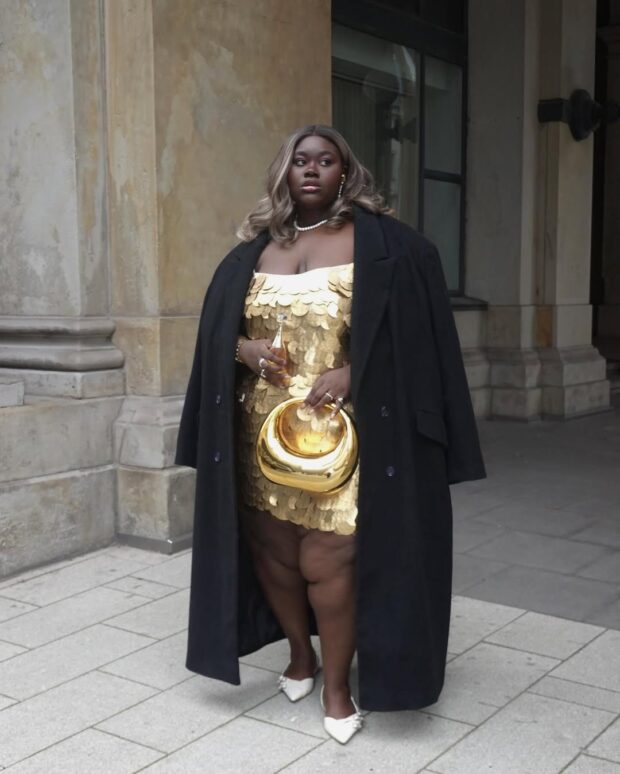 Dazzling Gold Sequins Under a Contrasting Oversized Coat — Winter Party Outfits