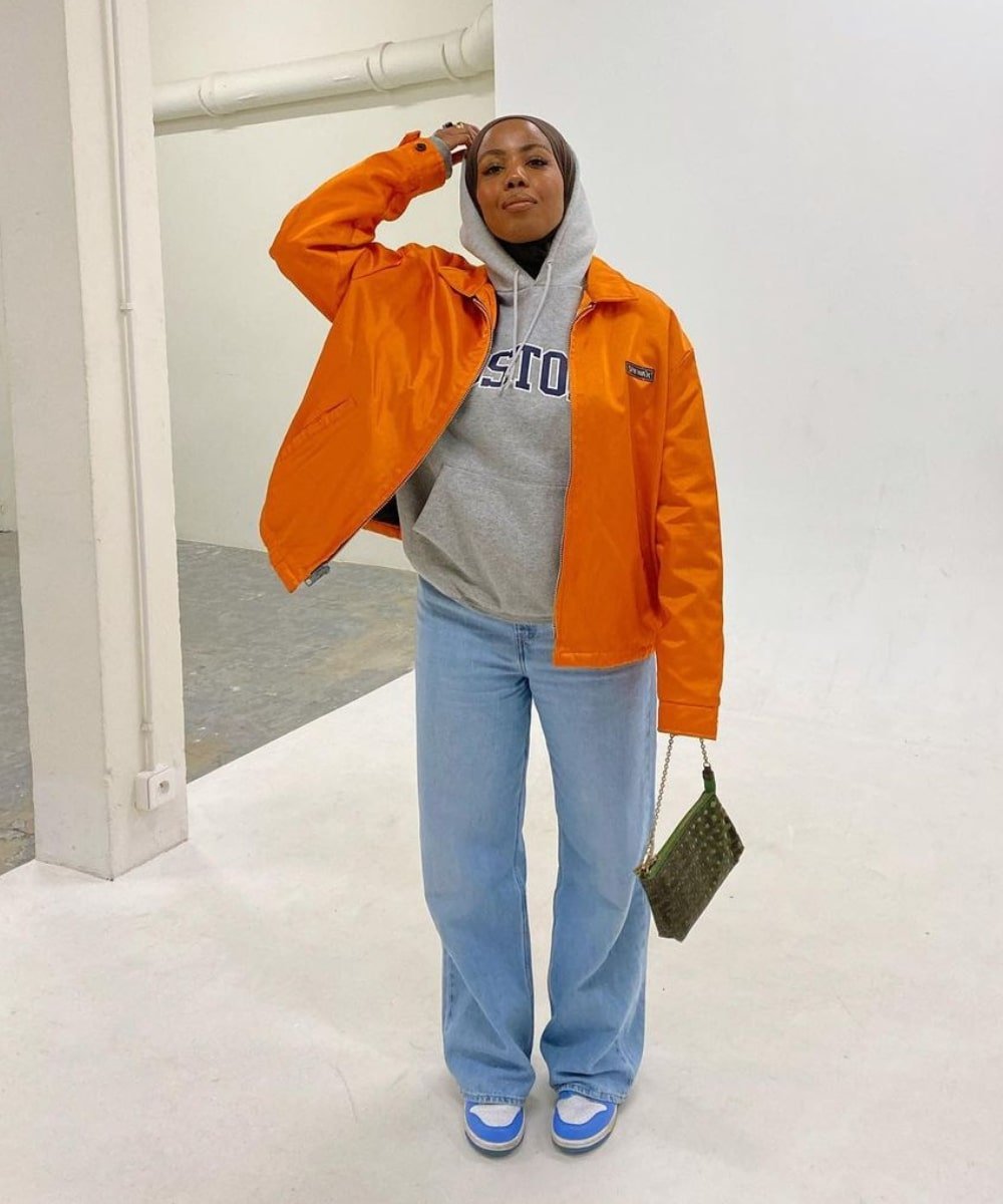 Vibrant Orange Jacket Over a Grey Hoodie — Hoodie Outfits
