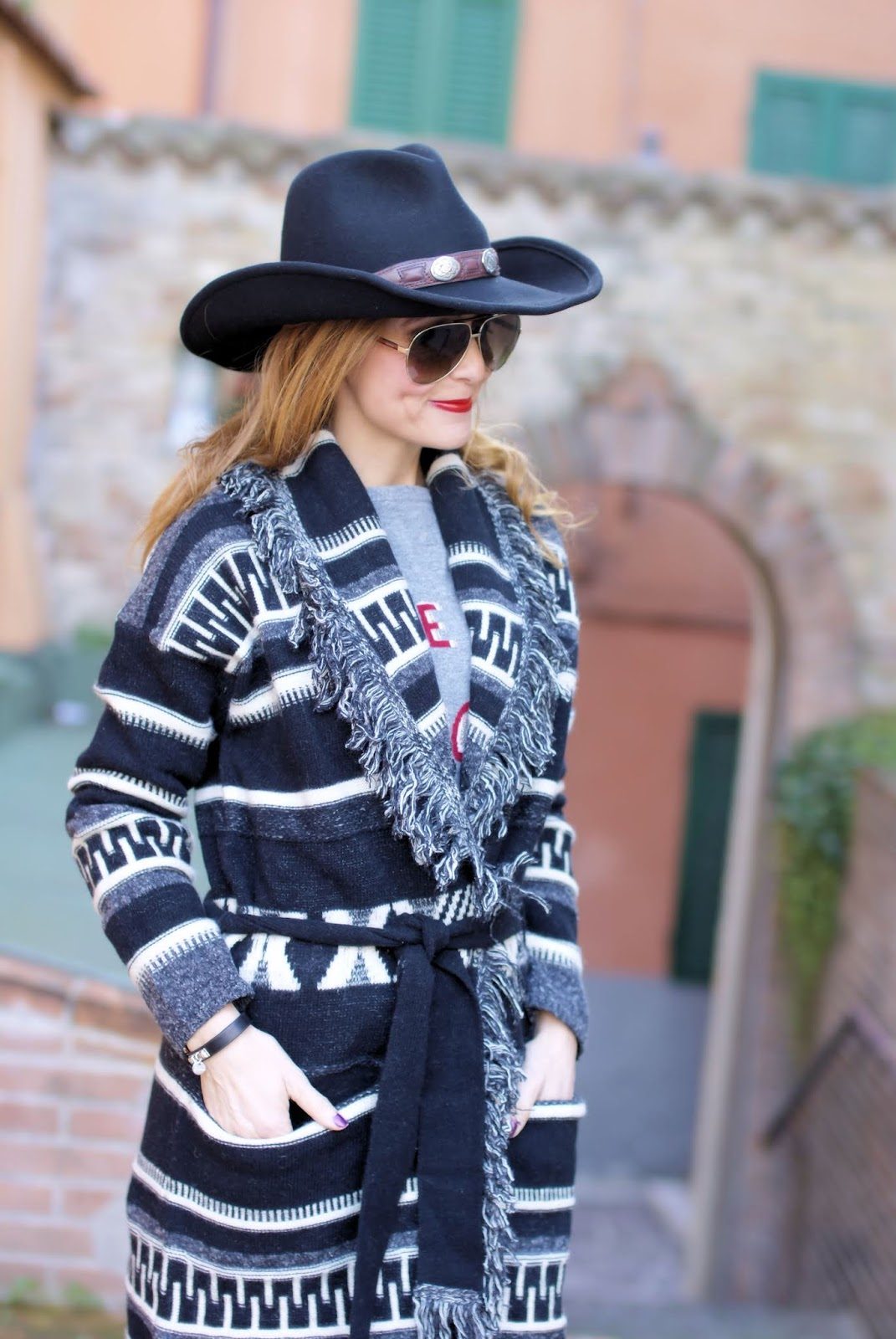 Country Western Knit Cardigan with Cowboy Hat and Denim — Nashville Winter Outfits
