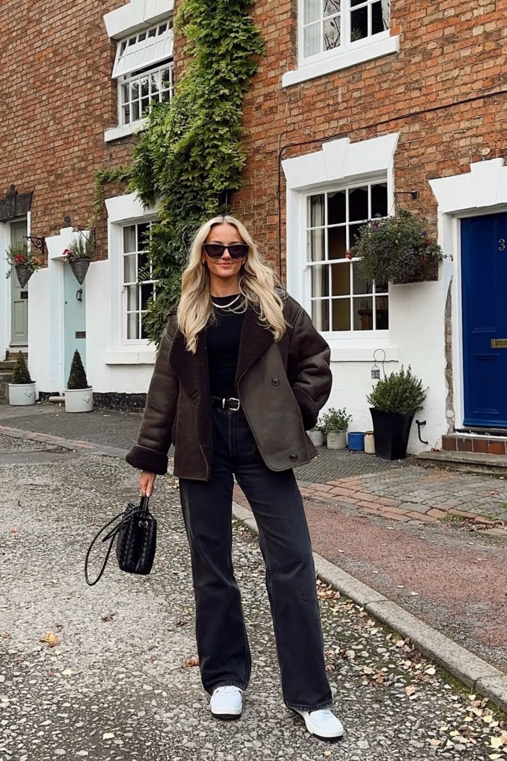 Shearling Jacket Pairs Effortlessly with Dark Jeans and a Black Top — Casual Winter Outfits