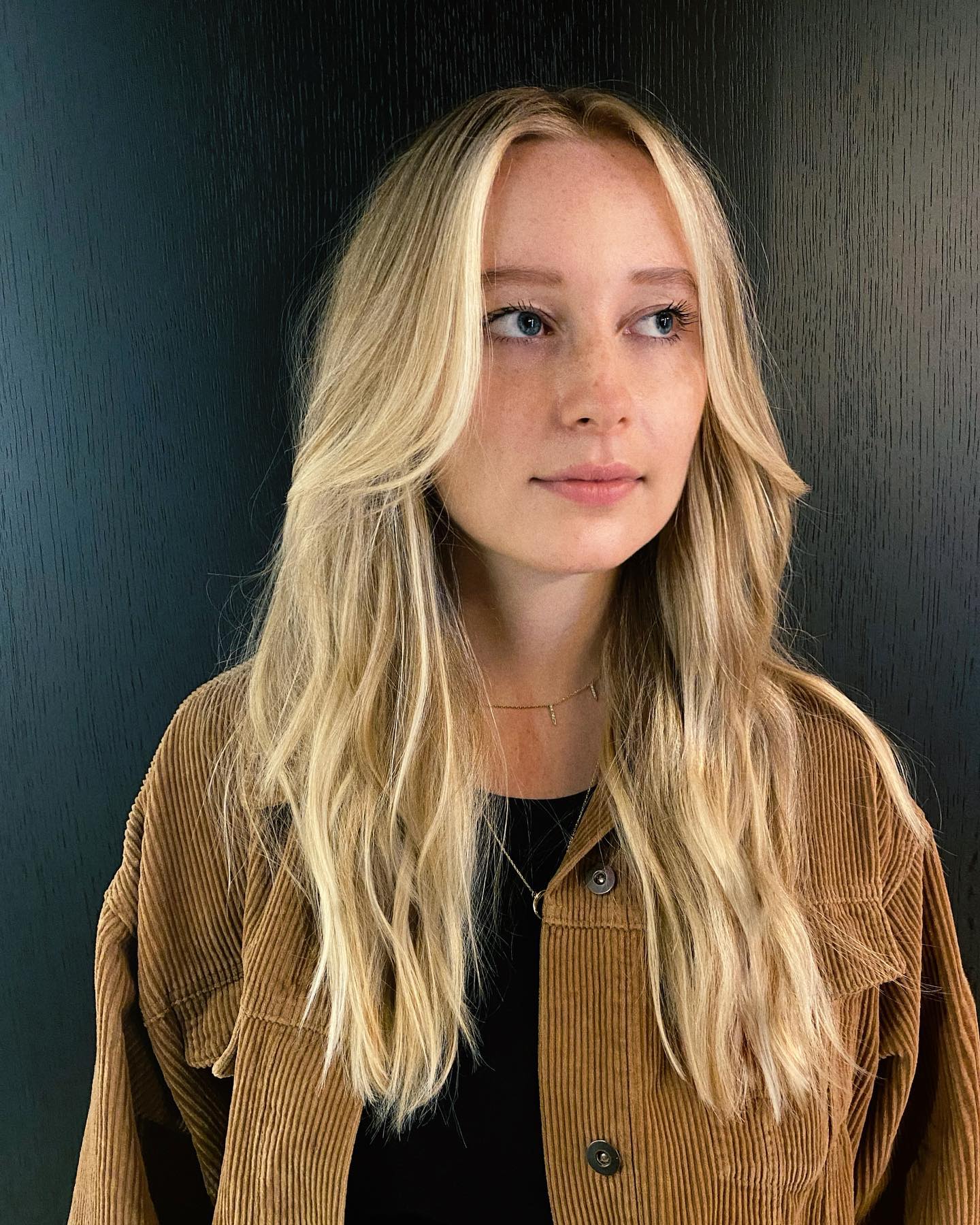 Ash Blonde With Face-Framing Bangs Ash Blonde With Face-Framing Bangs — Winter Hair Colors for Pale Skin
