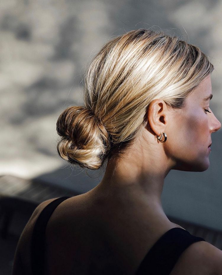 Low Bun With Subtle Highlights — Low Maintenance Winter Haircuts