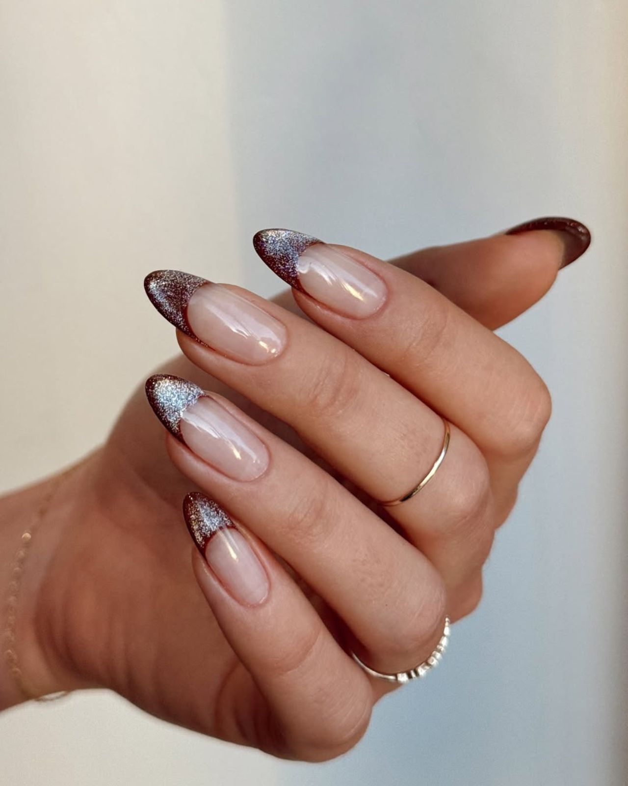 Sheer Nude Base Brown And Silver Glitter Brown Silver Glitter French Medium Almond Nails Sheer Nude Base Brown And Silver Glitter Brown Silver Glitter French Medium Almond Nails — Winter Glitter Nails