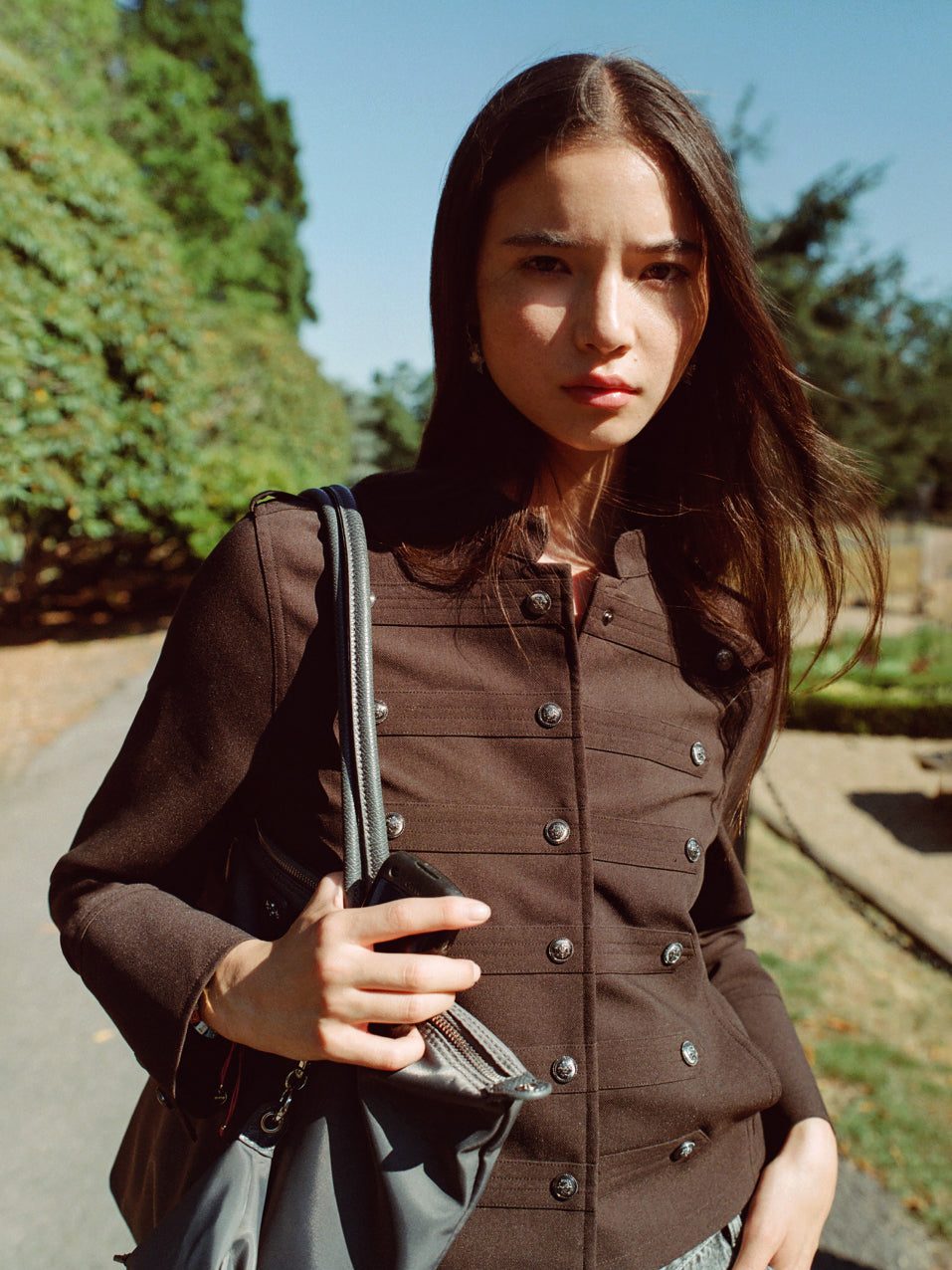Playful Casual: Brown Jacket with Plaid Skirt and Studded Shoes — Brown Coat Outfits