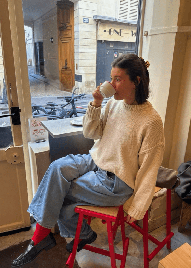 Cream Sweater with Jeans and a Pop of Red Socks — Winter Teacher Outfits
