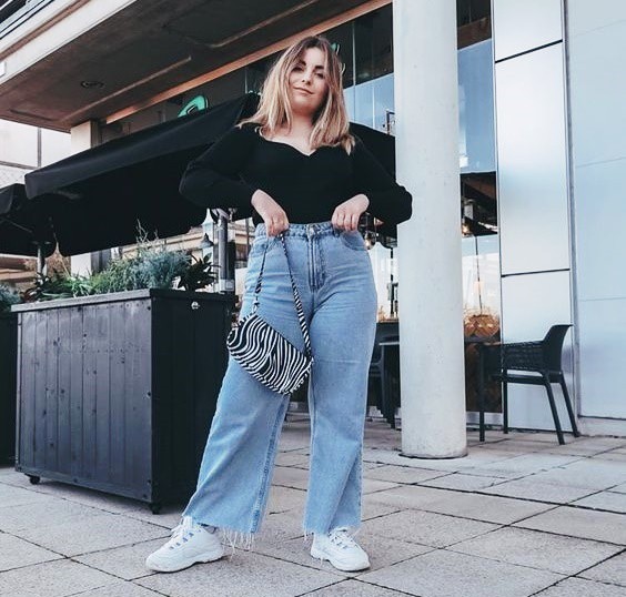 Zebra Print Bag Adds Flair to Black Top and Wide Leg Jeans Zebra Print Bag Adds Flair to Black Top and Wide Leg Jeans — Winter Outfits with Wide Leg Jeans