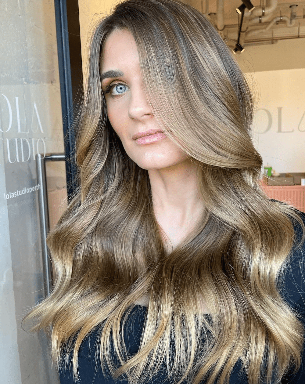 Wavy Blowout Visual Idea Wavy Blowout Visual Idea — Reverse Balayage