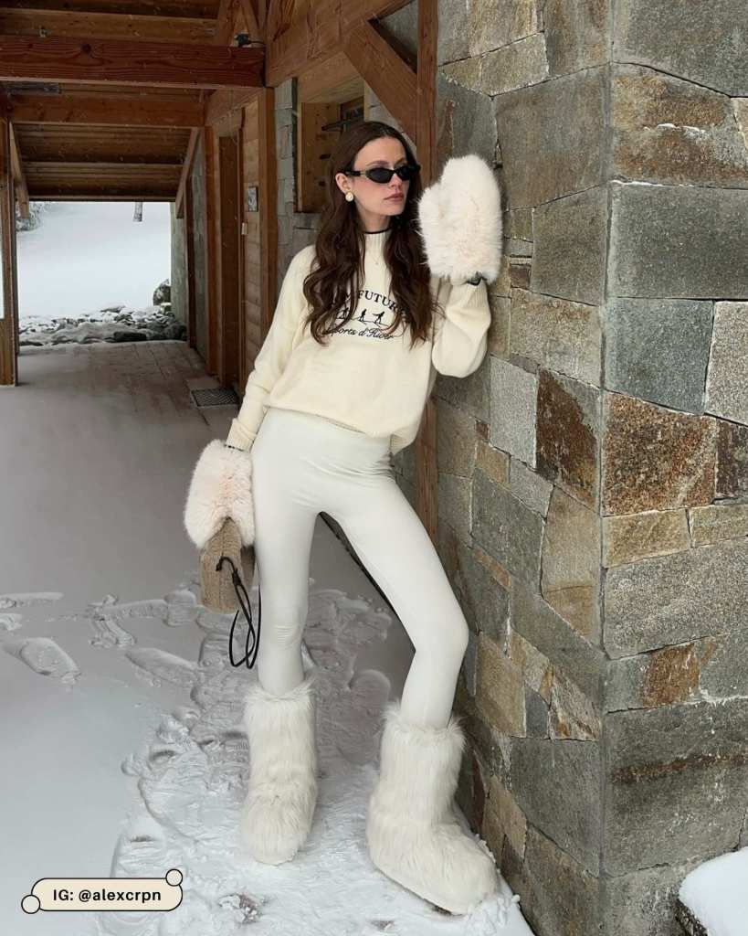 Cozy Cream Knit with Oversized Furry Boots and Mittens for a Comfortable Apres-Ski Look Cozy Cream Knit with Oversized Furry Boots and Mittens for a Comfortable Apres-Ski Look — Apres Ski Outfits