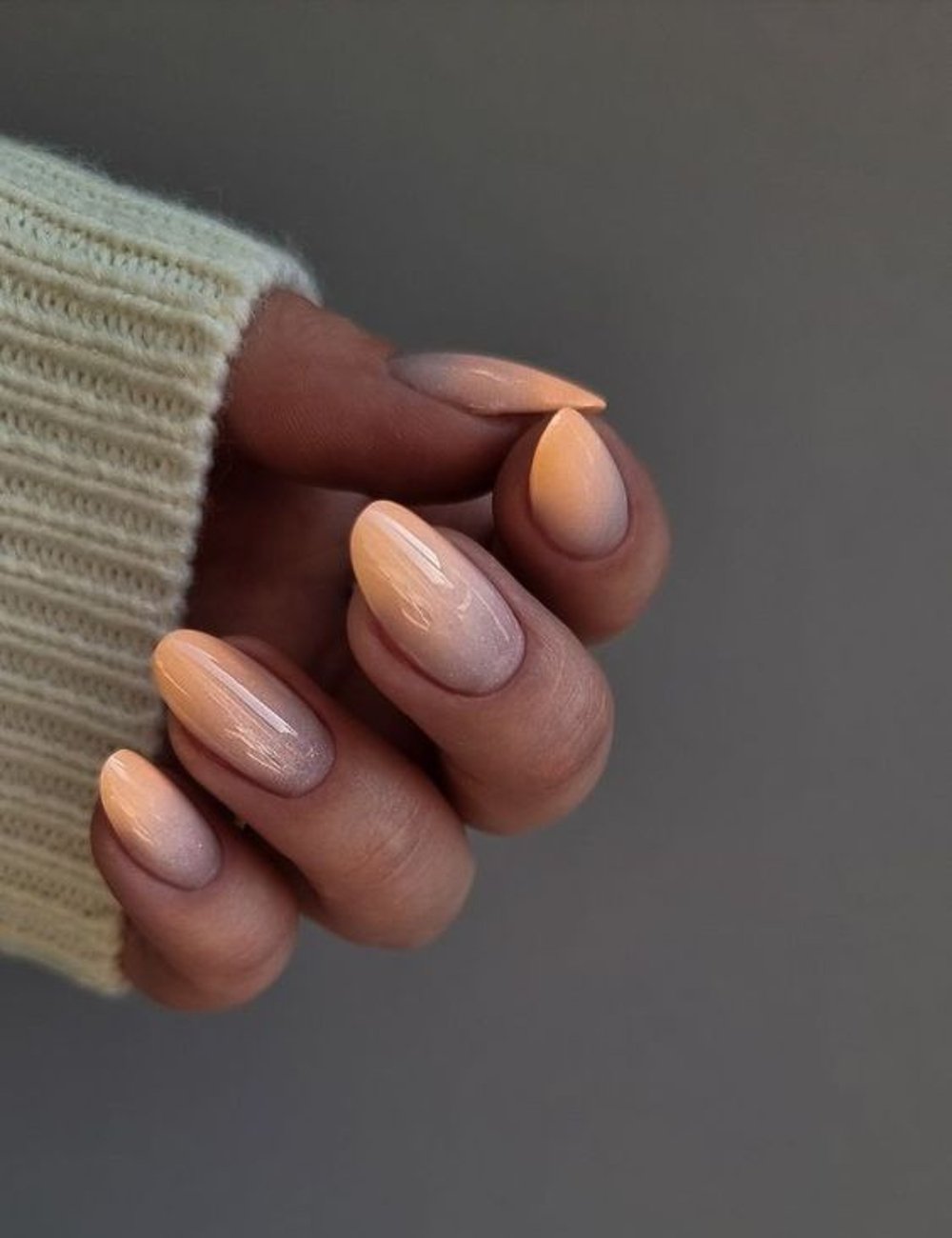 Subtle Glitter Peach Ombre Almonds Subtle Glitter Peach Ombre Almonds — Winter Nail Colors for Women Over 50