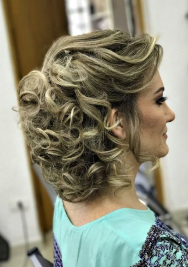 Voluminous Updo with Wispy Bangs Voluminous Updo with Wispy Bangs — Winter Haircuts for Women Over 50