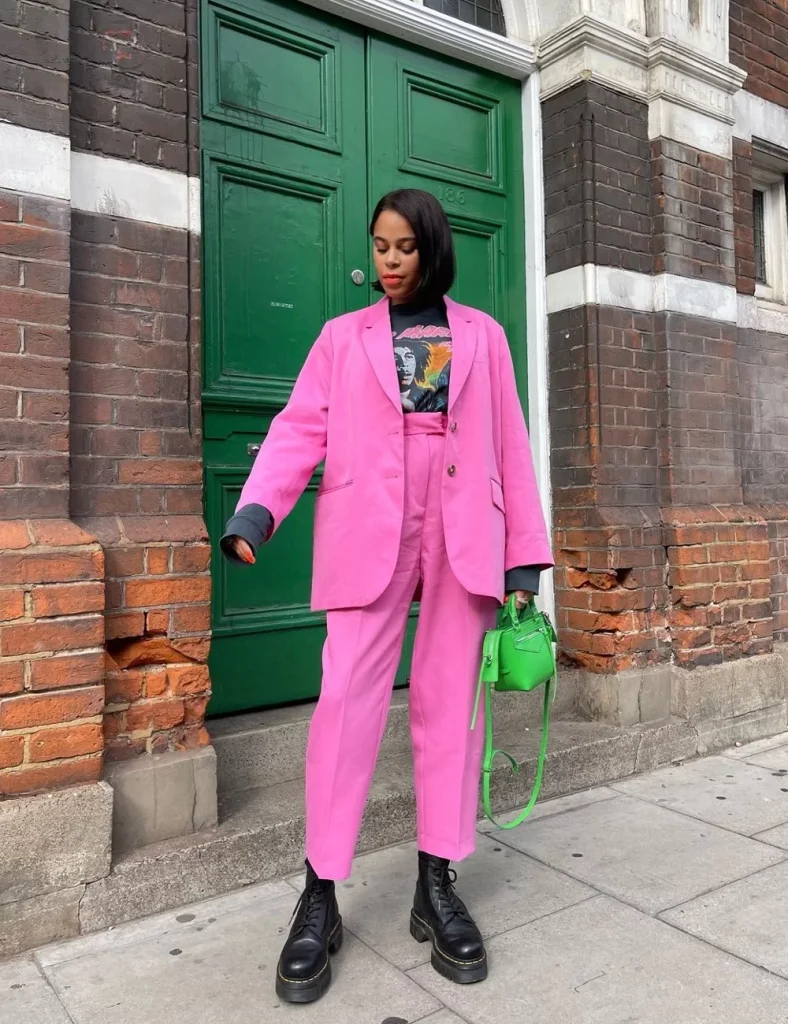 Bright Pink Suit with Graphic Tee and Black Combat Boots Bright Pink Suit with Graphic Tee and Black Combat Boots — Combat Boots Outfits
