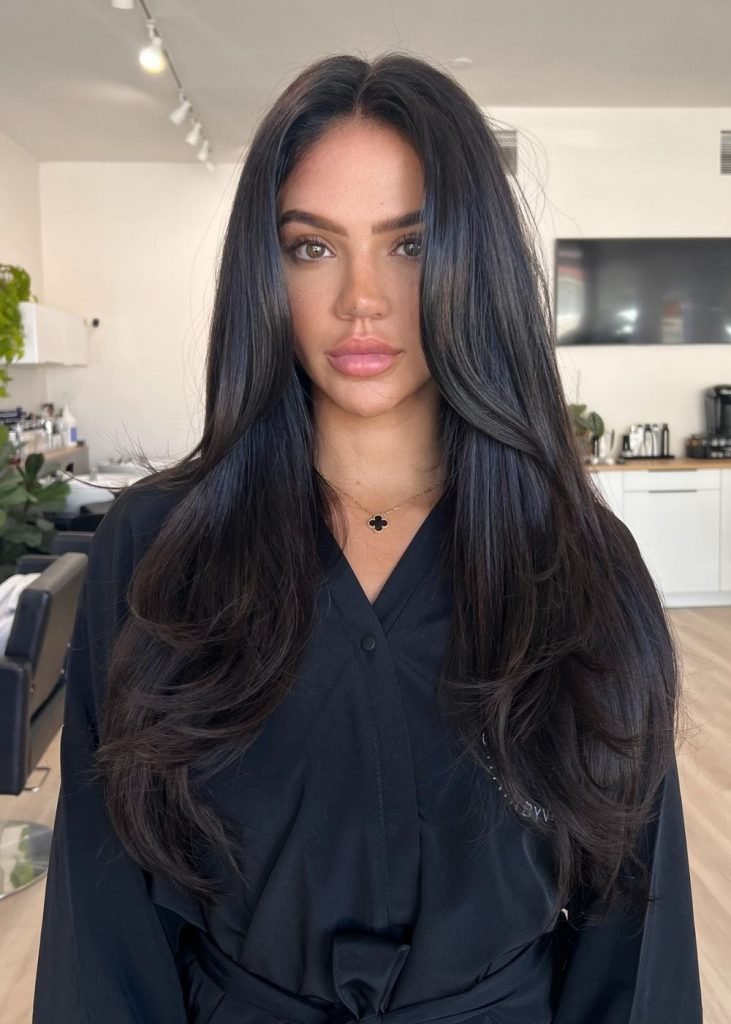 Voluminous Blowout With Curtain Bangs Voluminous Blowout With Curtain Bangs — Winter Haircuts for Straight Hair