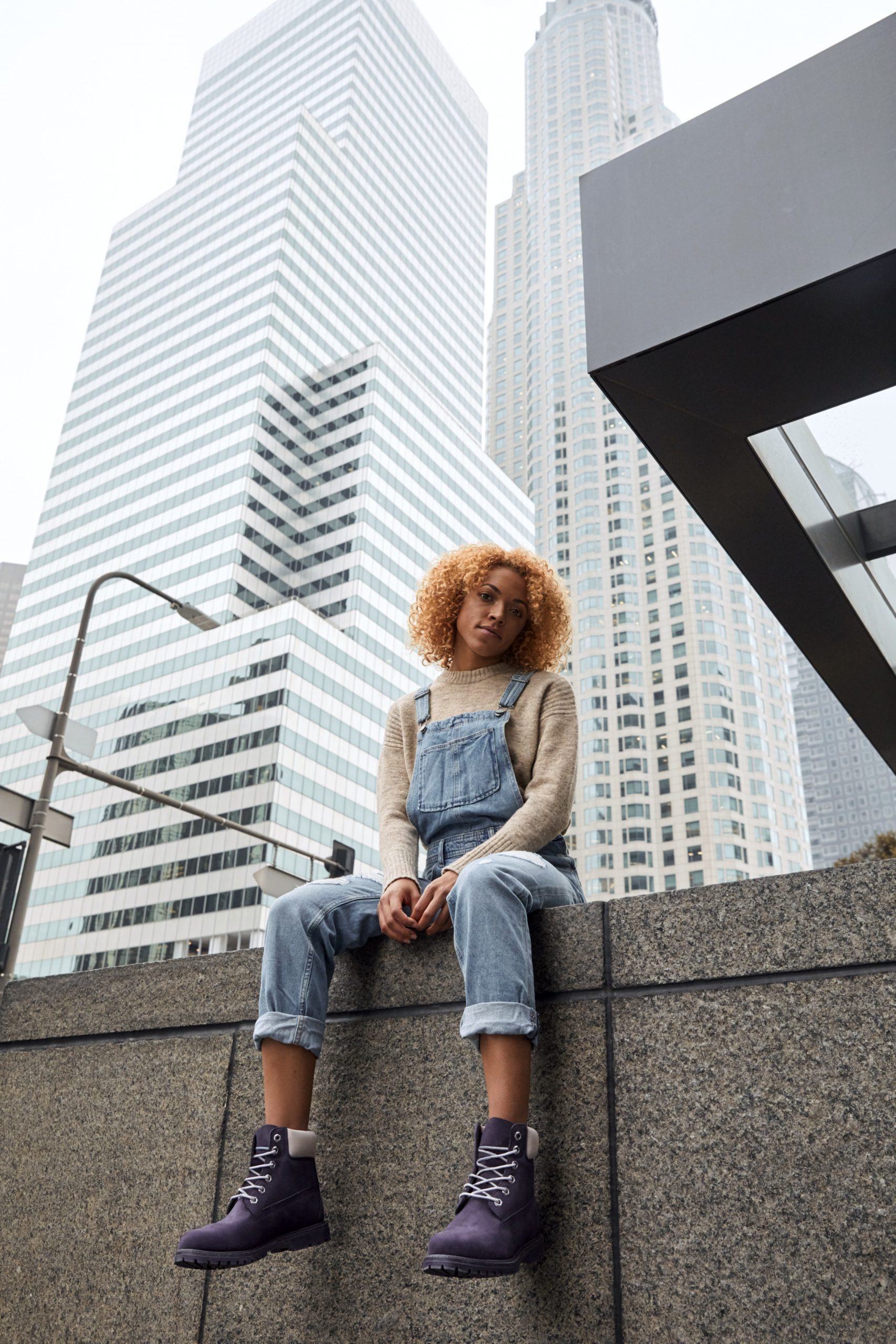 Purple Timberlands Paired with Denim Overalls and Knit Sweater — Timberland Boots Outfits