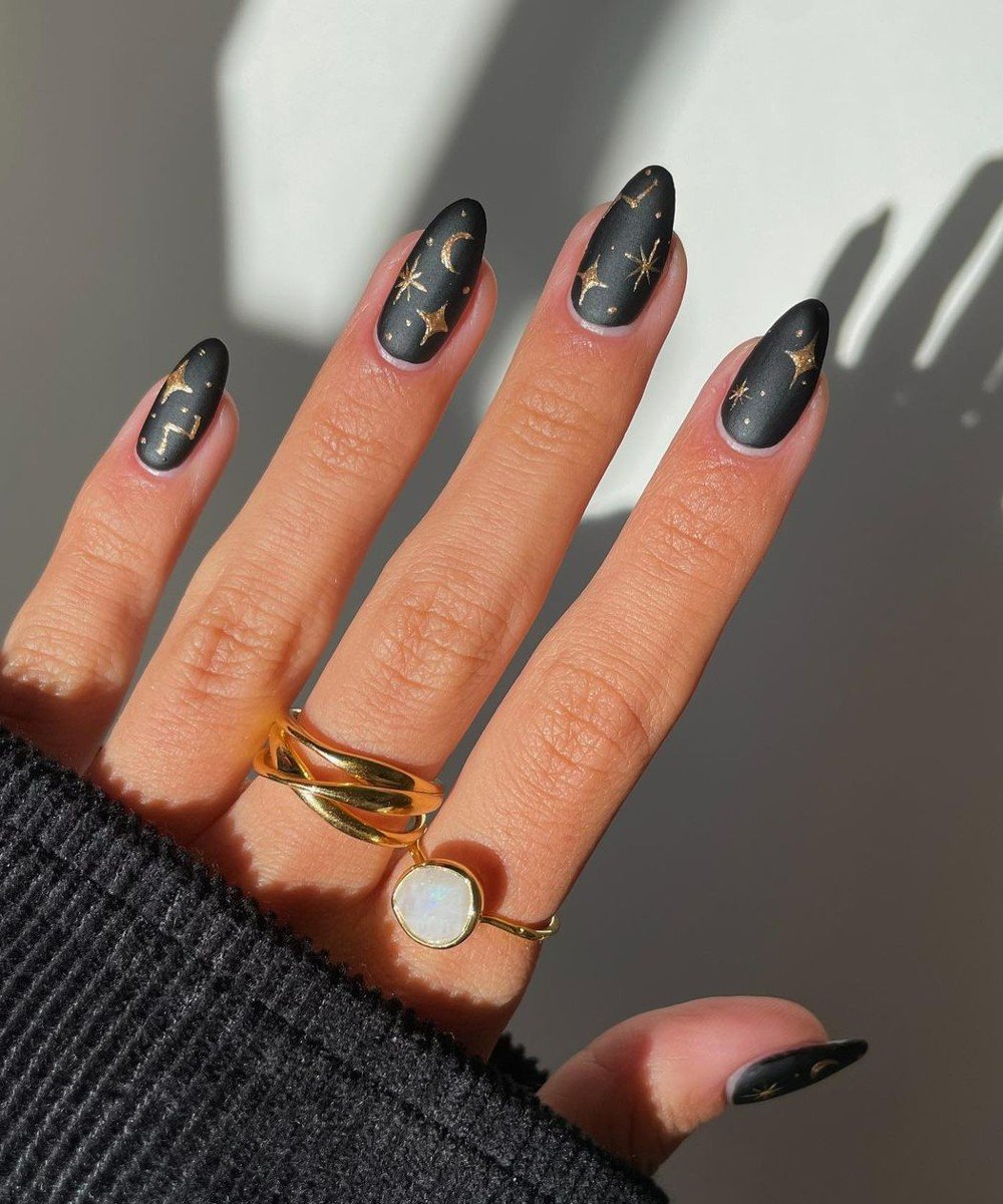 Matte Black With Gold Celestial Motifs Matte Black With Gold Celestial Motifs — Winter Black Nails