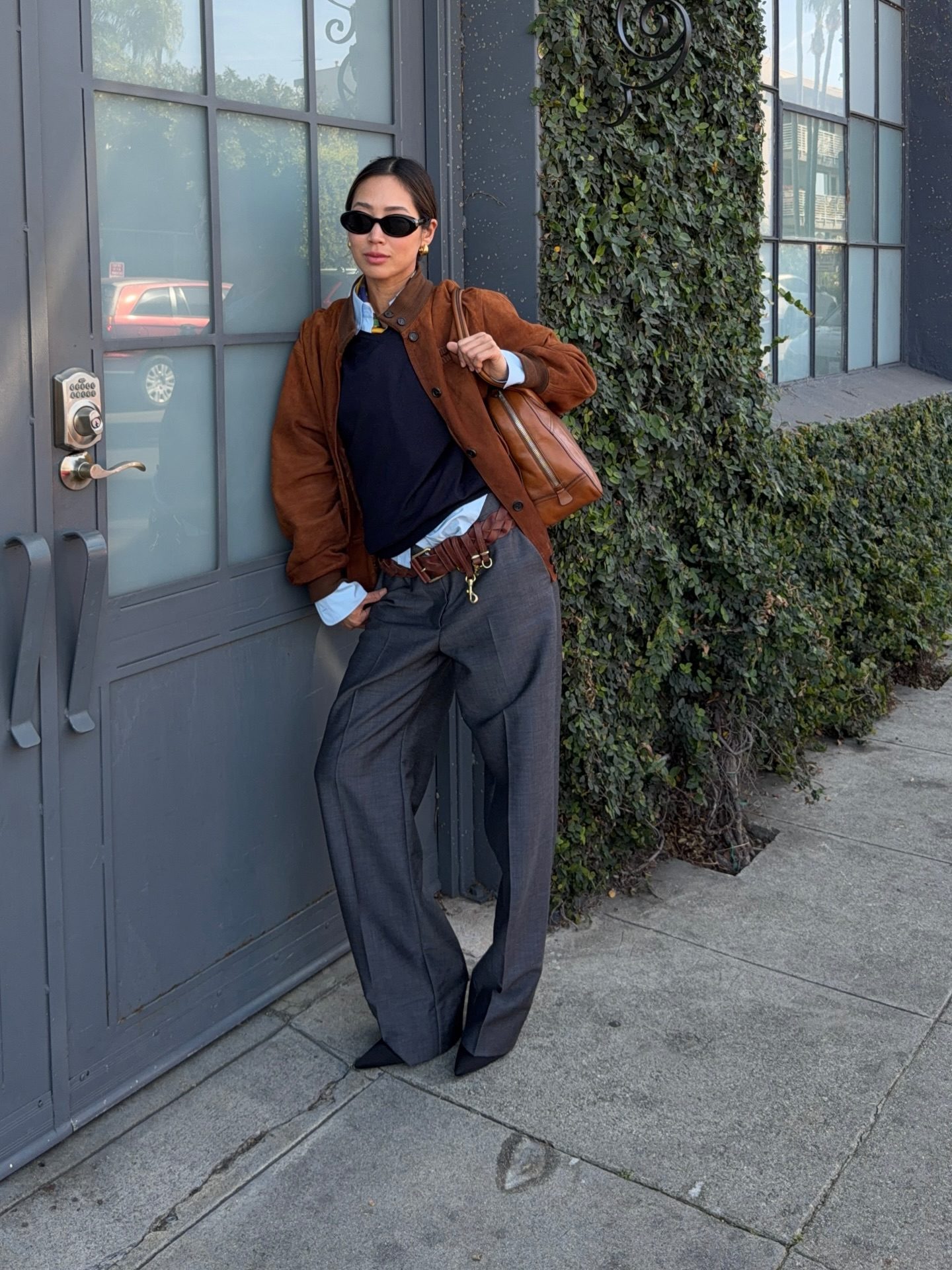 Brown Satin Bomber Jacket Over Collared Shirt and Navy Sweater — Casual Winter Outfits