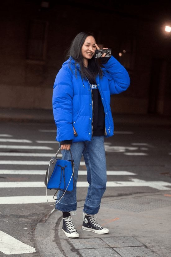 Vibrant Blue Puffer Jacket with Sweatshirt and Wide-Leg Jeans — Winter Puffer Jacket Outfits