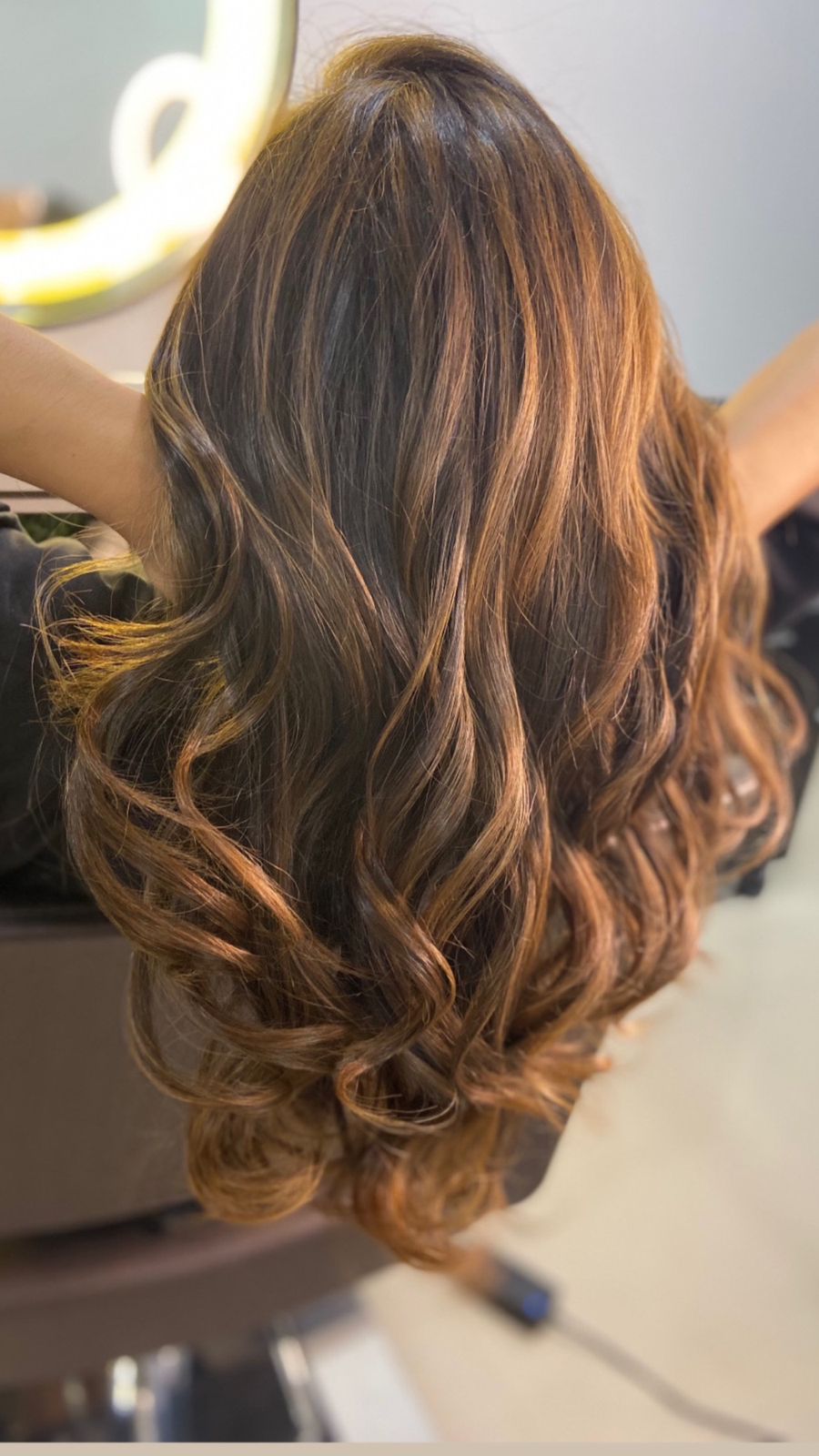 Cascading Curls With Warm Highlights — Winter Hairstyles for Work