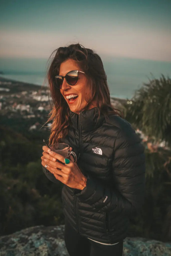Black Puffer Jacket with High Collar for Winter Hikes — Winter Hiking Outfits