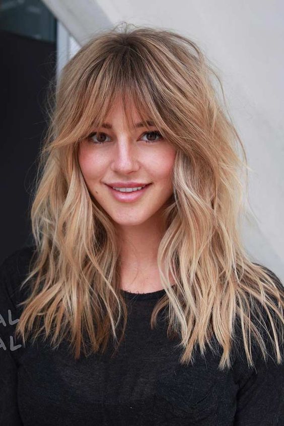 Honey Blonde Shag with Curtain Bangs — Winter Haircuts with Bangs