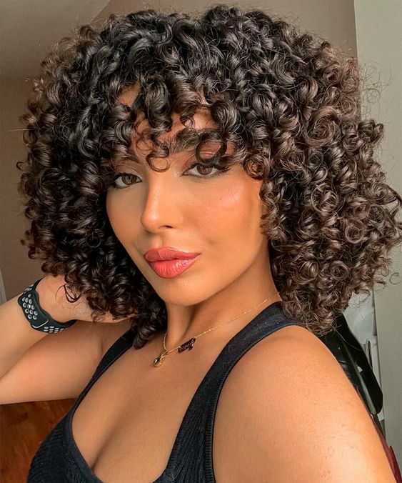 Chin Length Bob With Curtain Bangs — Winter Haircuts for Curly Hair