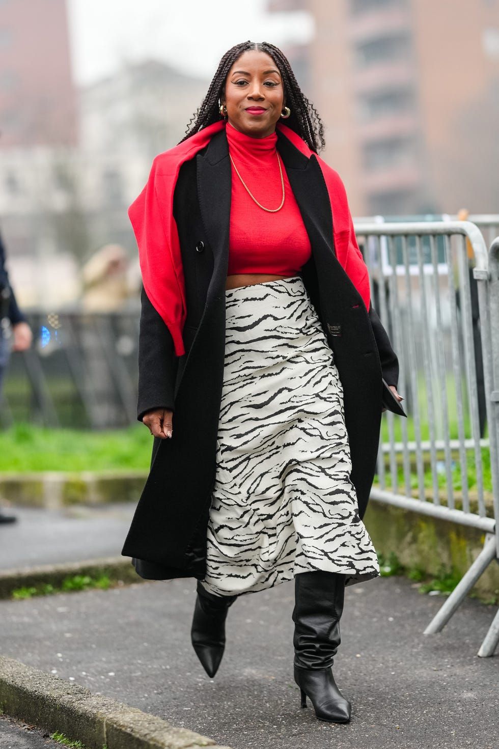 Striking Zebra Print Skirt with a Black Wool Coat and Red Accents — Fall to Winter Outfits
