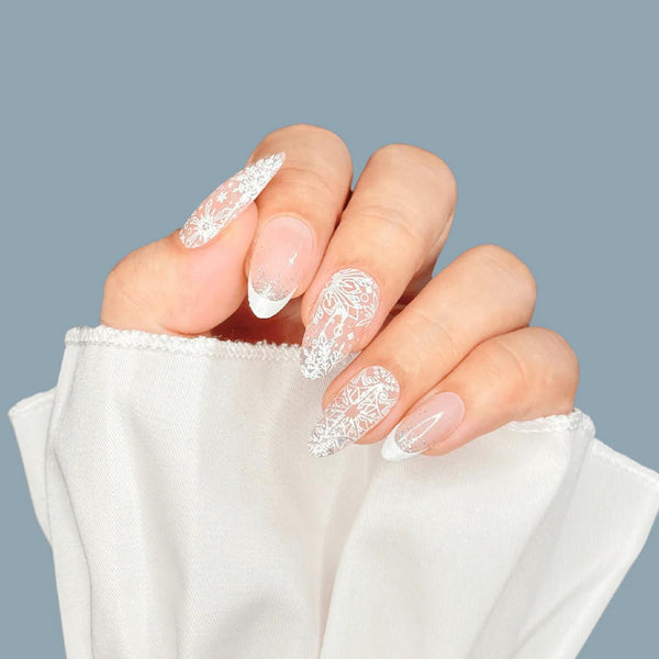Intricate Snowflake Clear Glitter French Almond Nails Intricate Snowflake Clear Glitter French Almond Nails — Winter Glitter Nails