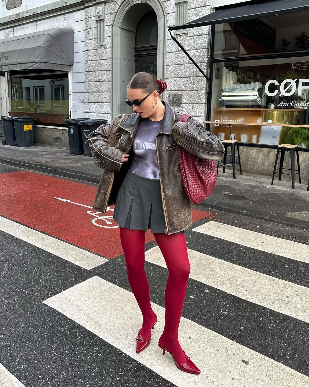 Red Tights and Woven Tote Bag Add Fiery Accents to Leather Jacket Look — Colorful Winter Outfits