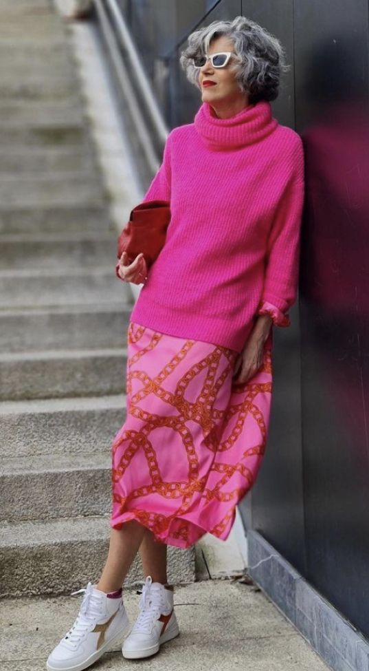 Vibrant Hot Pink Turtleneck with Midi Skirt and Sneakers — Winter Outfits for Women Over 60