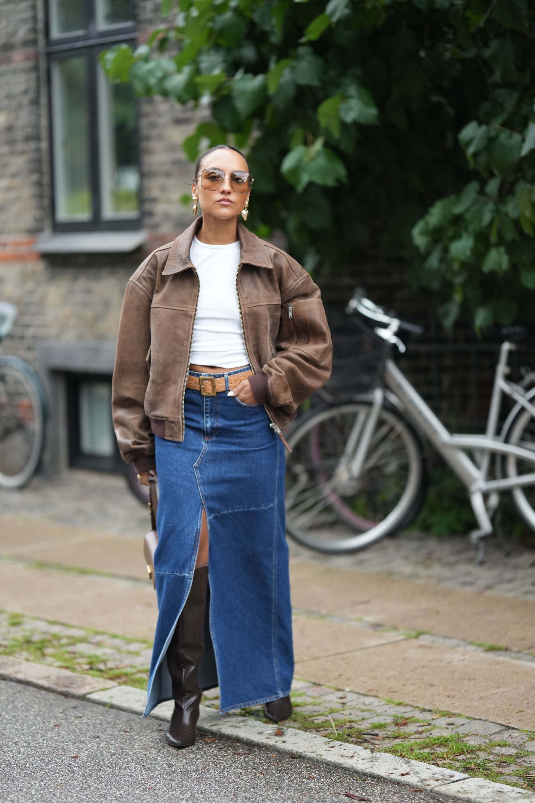 Brown Bomber Jacket Over White Tee with Denim Maxi Skirt — Winter Outfits for Warm Weather