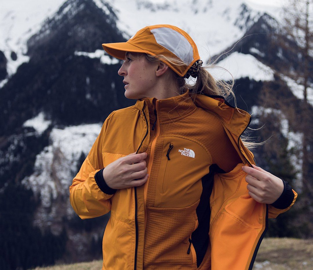 Layered Orange Technical Jacket for Outdoor Training — Winter Hiking Outfits