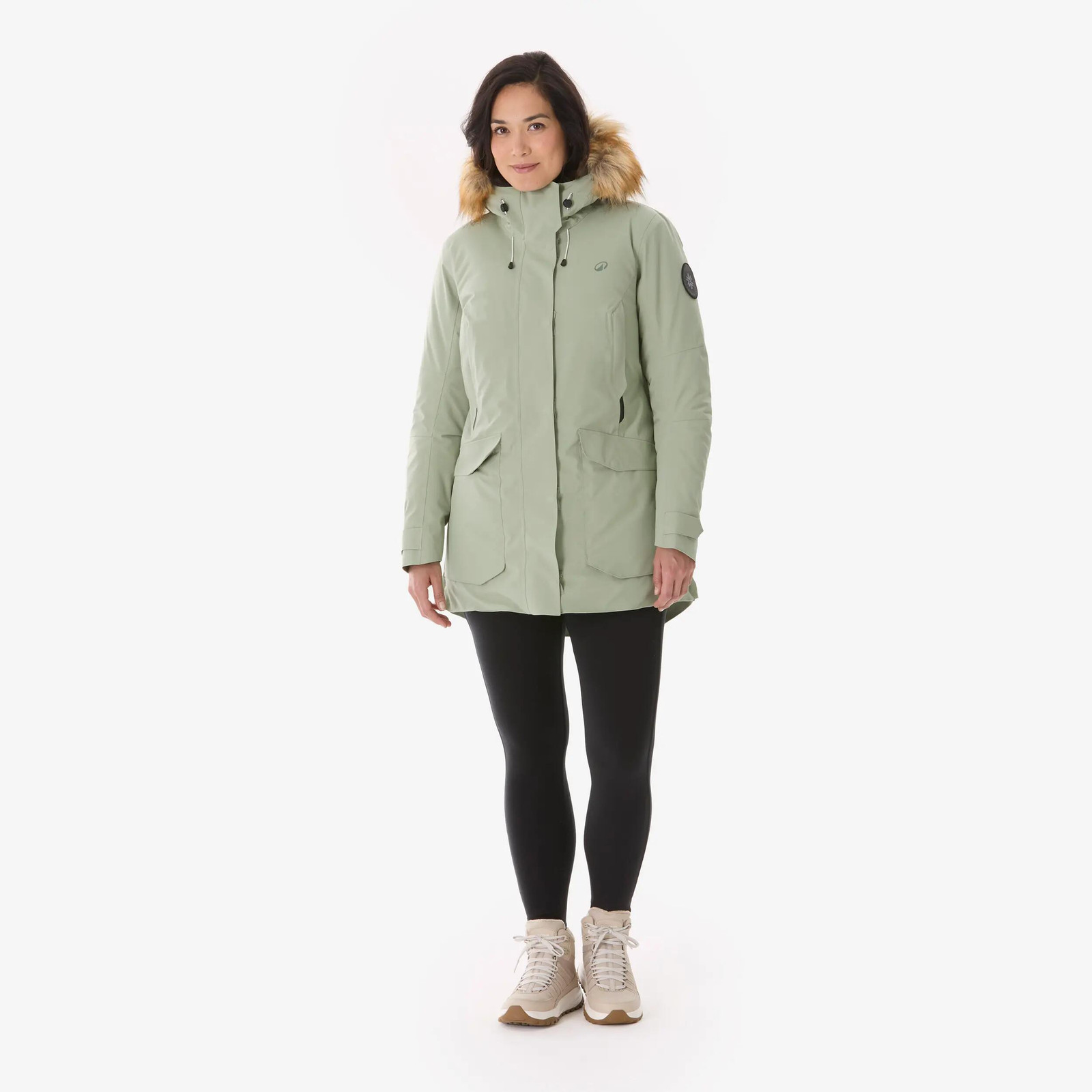 Light Green Parka with Fur-Lined Hood and Beige Boots — Winter Hiking Outfits