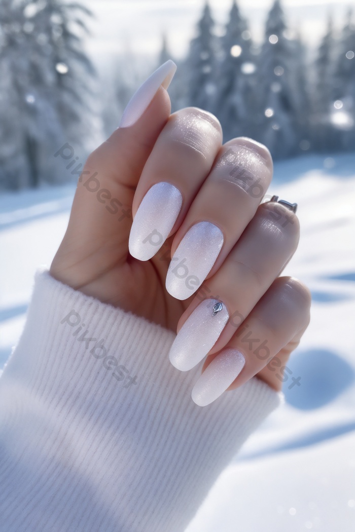 Shimmering White Almonds with a Single Rhinestone Shimmering White Almonds with a Single Rhinestone — Winter Nail Colors for Women Over 50