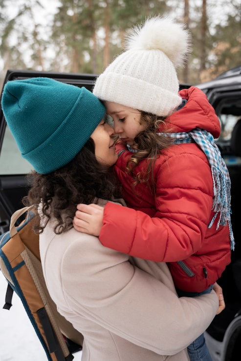 Cozy Embrace: Puffer Jacket and Beanie for a Warm Winter Hug — Winter Family Photo Outfits