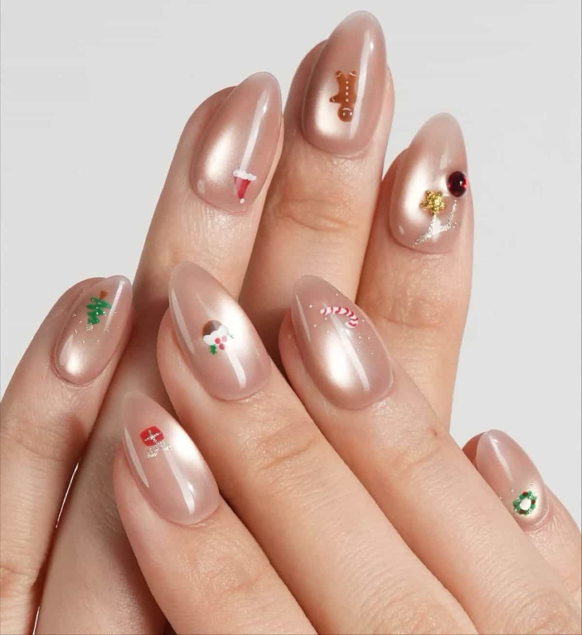 Sheer Nude Christmas Decal Short Almond Nails Sheer Nude Christmas Decal Short Almond Nails — Short Winter Nails