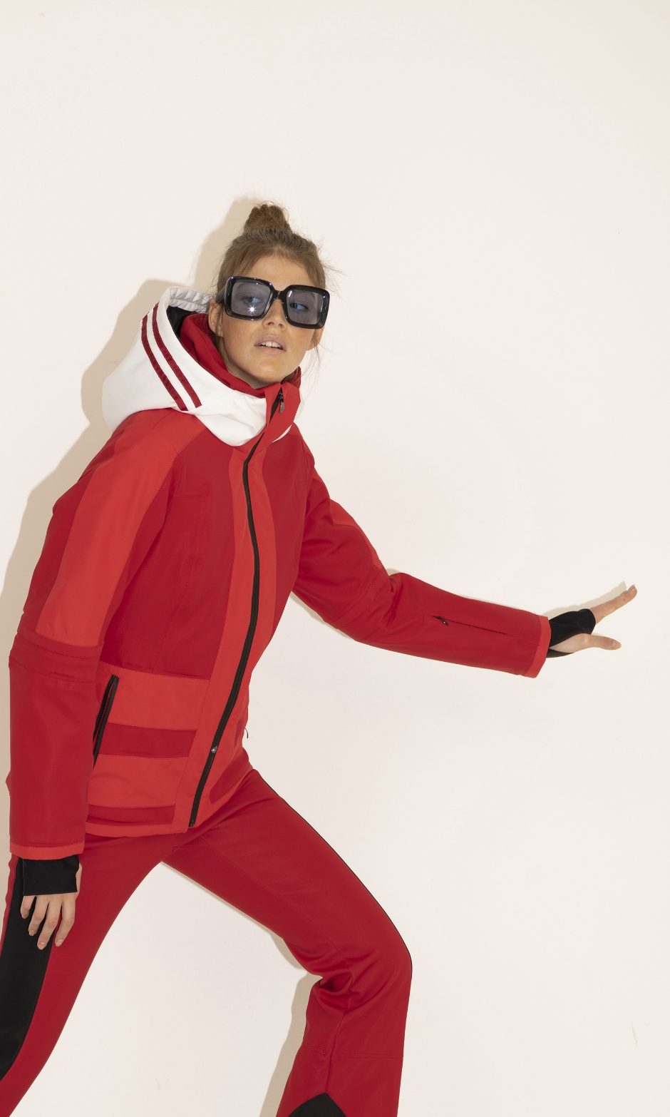 Bold Red Ski Suit with Contrasting Accents for a Striking Apres-Ski Presence Bold Red Ski Suit with Contrasting Accents for a Striking Apres-Ski Presence — Apres Ski Outfits