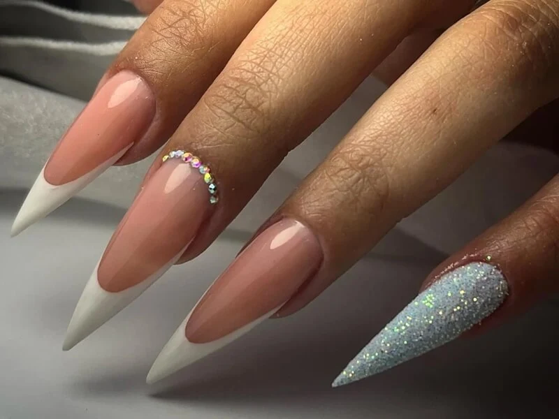 Pink Chrome & Glitter Stilettos with Rhinestone Cuticle Line Pink Chrome & Glitter Stilettos with Rhinestone Cuticle Line — Winter Stiletto Nails