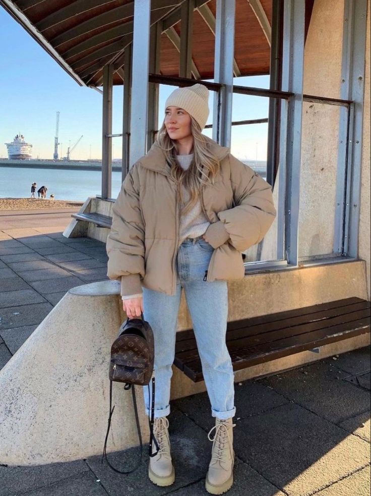Oversized Beige Puffer with Cream Sweater and Straight Jeans — Winter Puffer Jacket Outfits