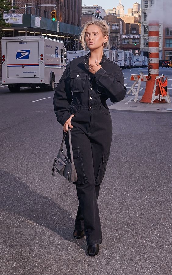 Black Denim Utility Jumpsuit with Square-Toe Boots — NYC Winter Outfits